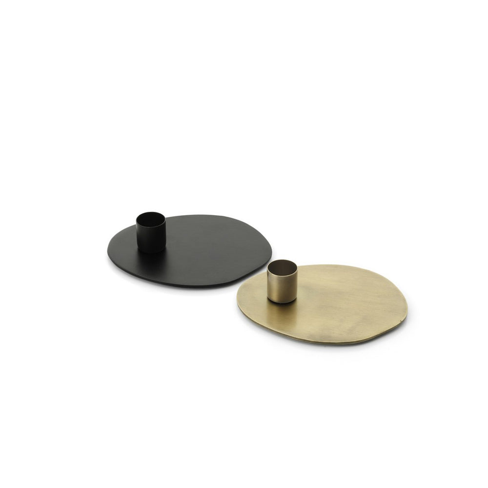Two round metal coasters, one black and one gold, on a white background.