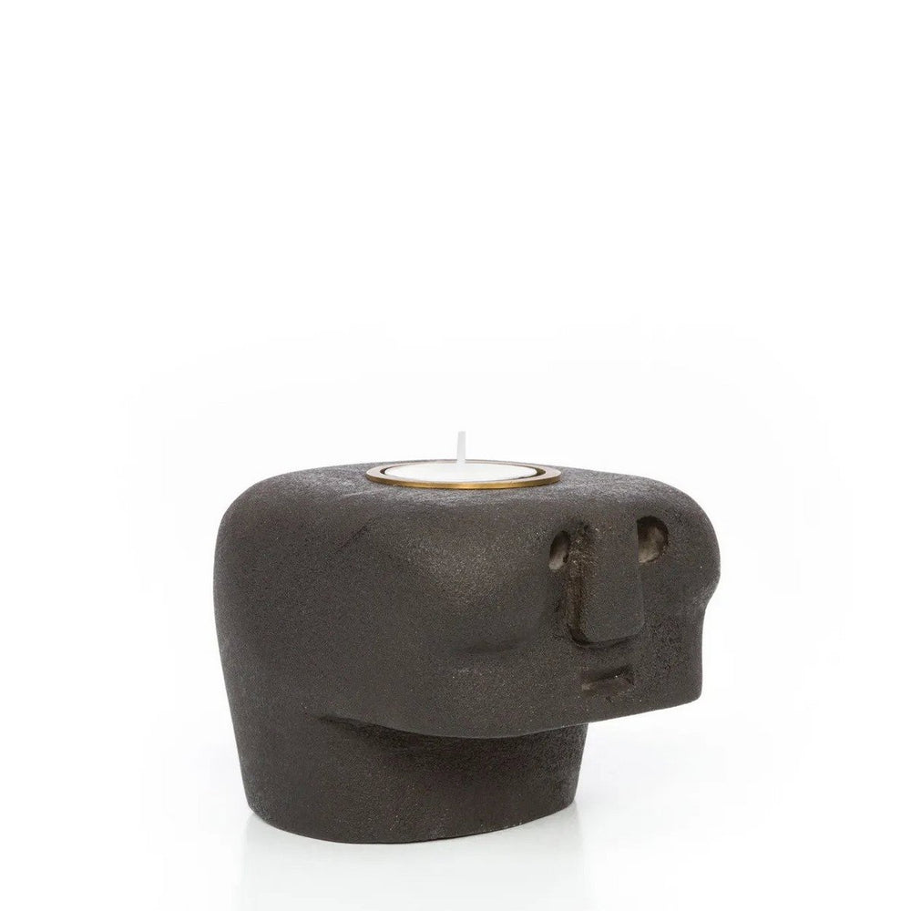 Ceramic bear-shaped candle holder on a white background