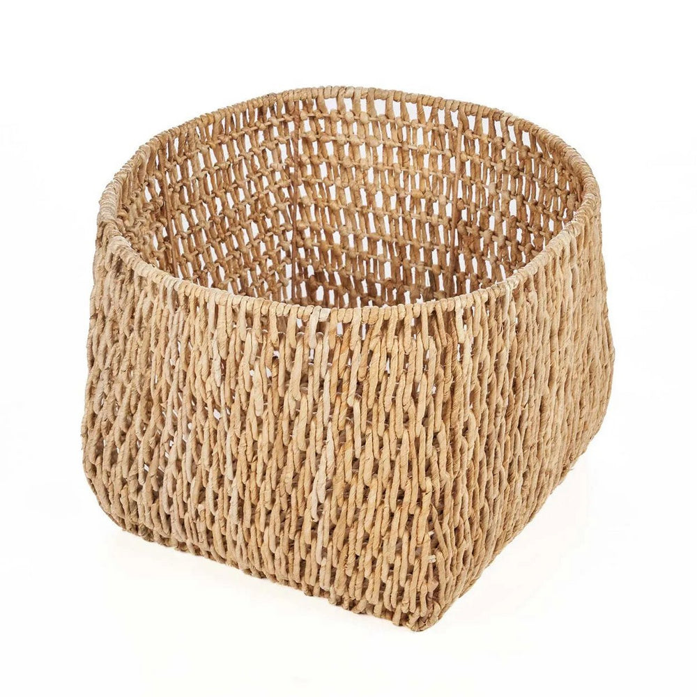 Natural palm leaf basket on a white background