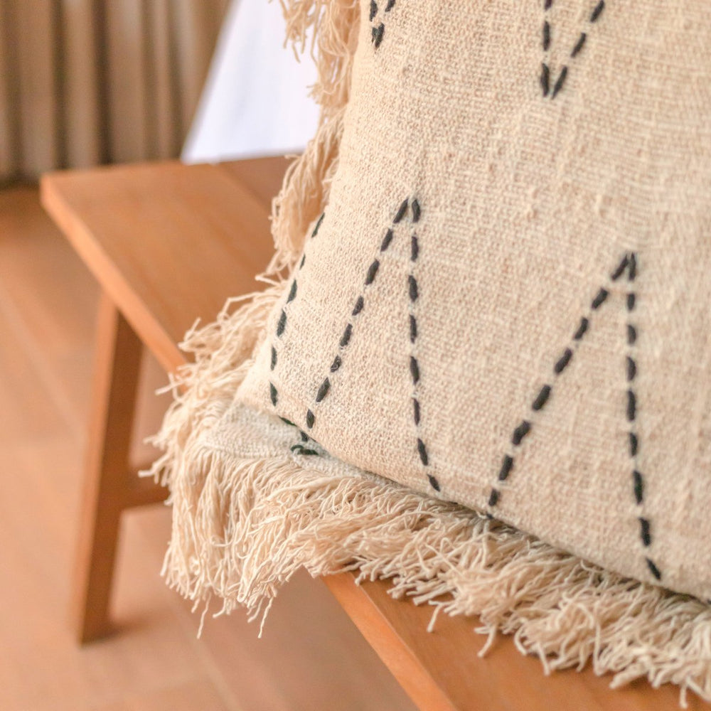 Black and white handwoven cotton cushion cover with zigzag pattern and fringes