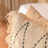 Black and white handwoven cotton cushion cover with zigzag pattern and fringes