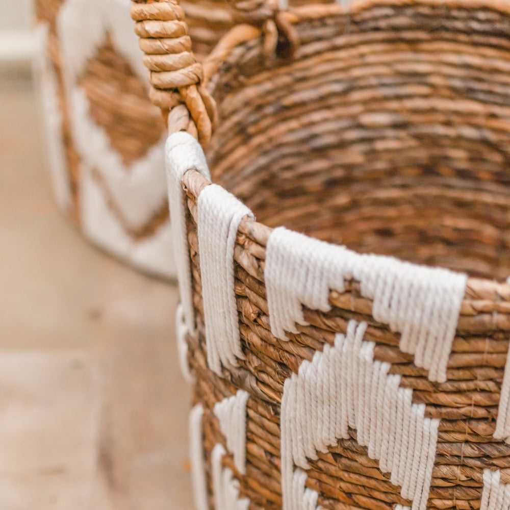 Brown banana fibre basket with white cotton macrame pattern
